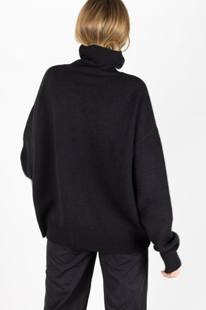 Roll neck sweater in black yak wool