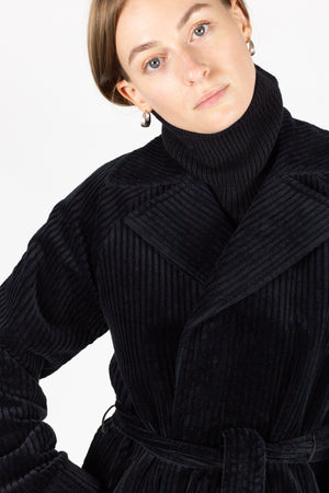 Black cord coat, belted with raglan sleeve